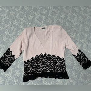 Elaris pink v neck sweater with black lace and shoulder pads